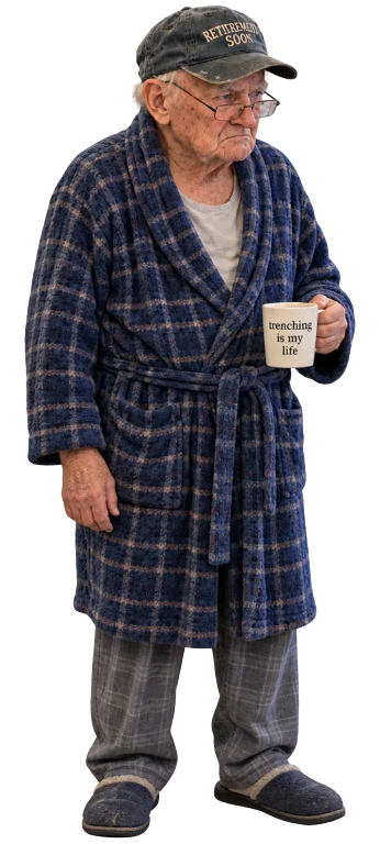 An elderly man in a plaid robe, reading glasses and a Retirement Soon cap, holding a mug that reads trenching is my life